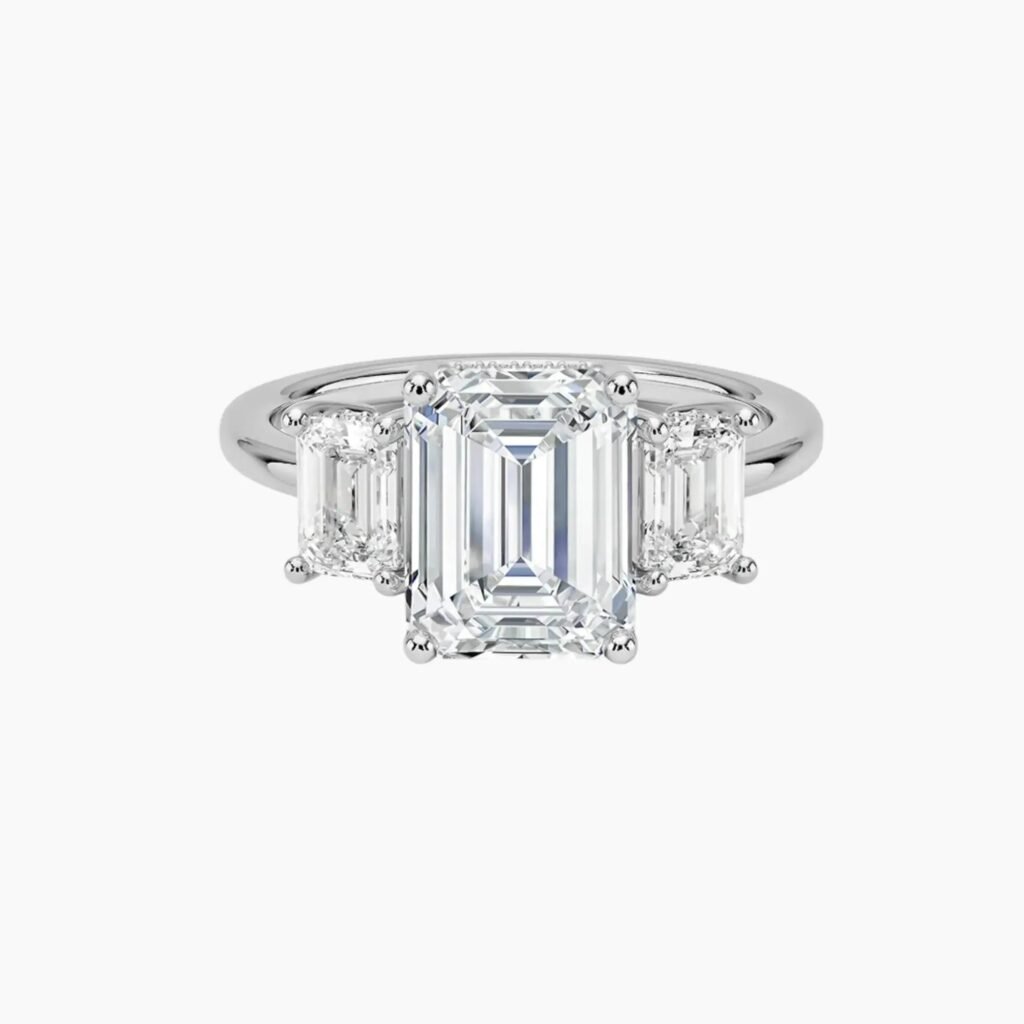 Aurelia Hidden Halo Three Stone Emerald