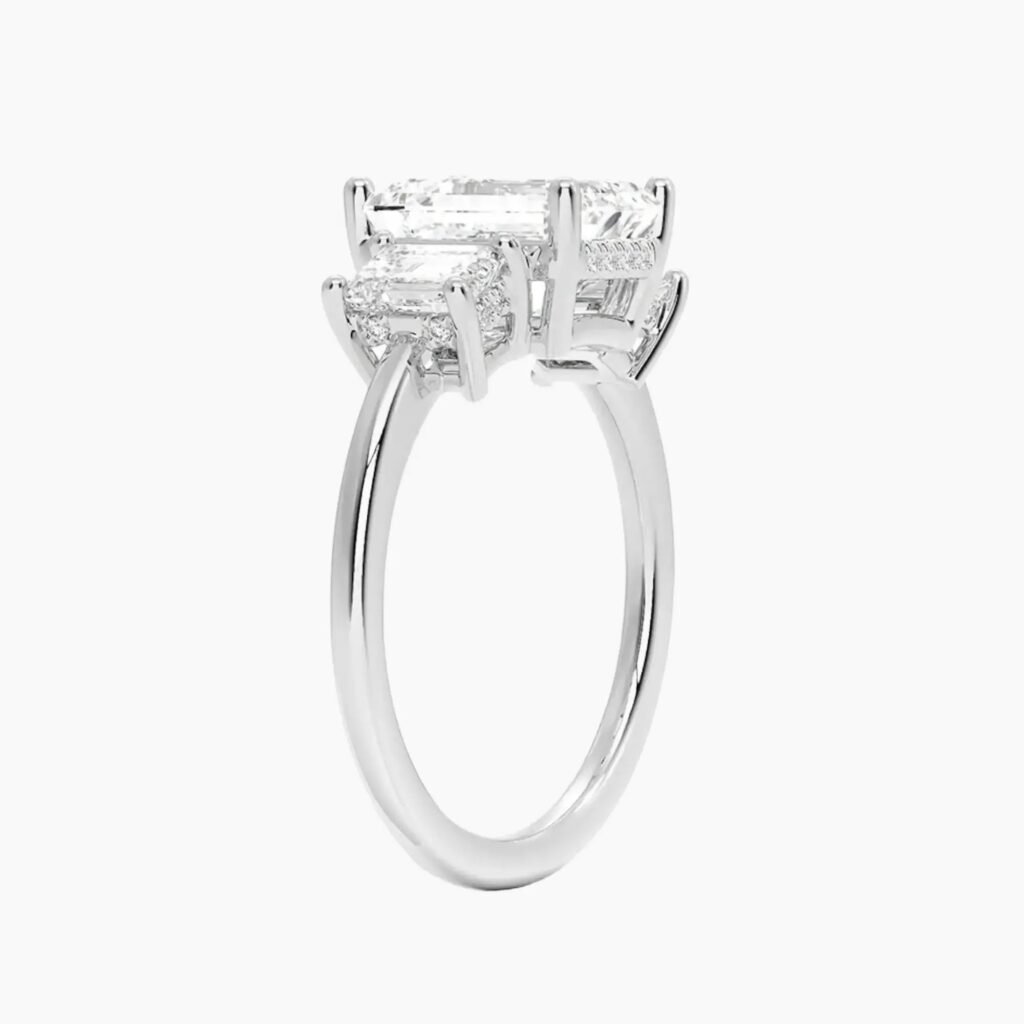 Aurelia Hidden Halo Three Stone Emerald